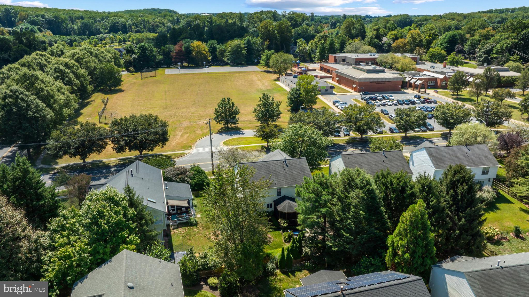 2603 Spartan Road Olney, MD 20832 - Photo 60 of 62 an aerial view of lake residential house with outdoor space and trees all around