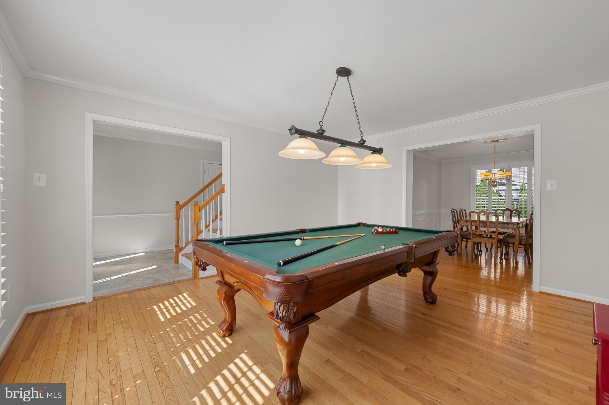 2603 Spartan Road Olney, MD 20832 - Photo 6 of 62 a room with lots of furniture and a chandelier