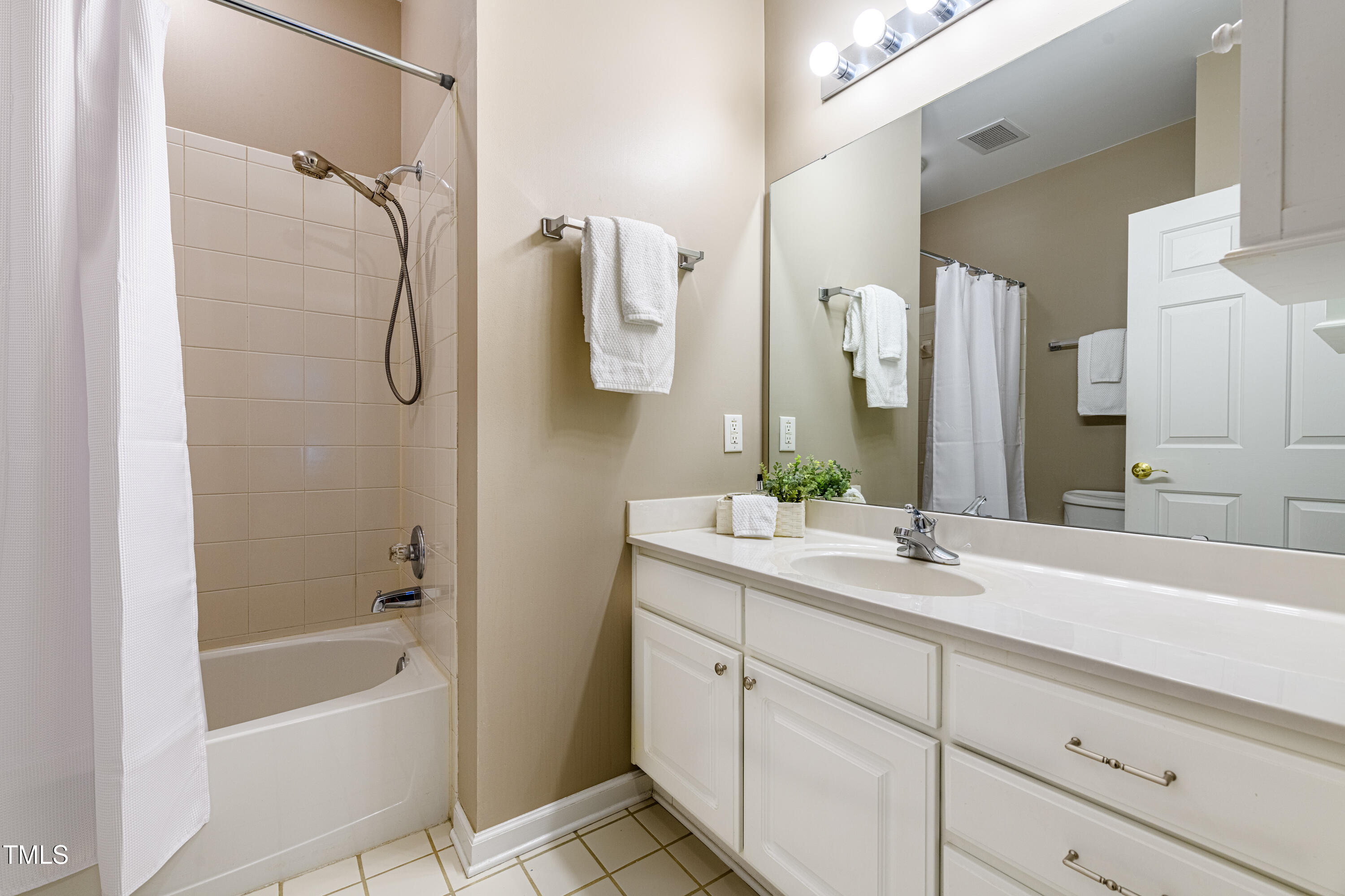 8231 Allyns Landing Way, Unit 301 Raleigh, NC 27615 - Photo 20 of 32 020_Primary Bathroom