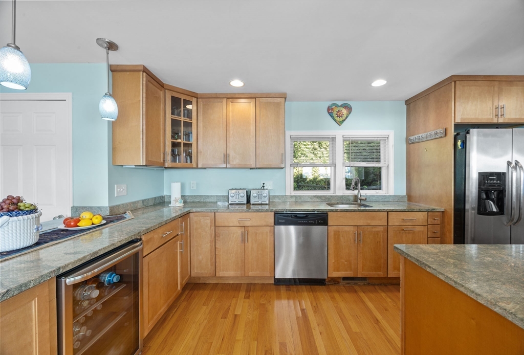 2 Wychunas Avenue Wareham, MA 02532 - Photo 16 of 37 a kitchen with stainless steel appliances granite countertop a sink a stove and refrigerator
