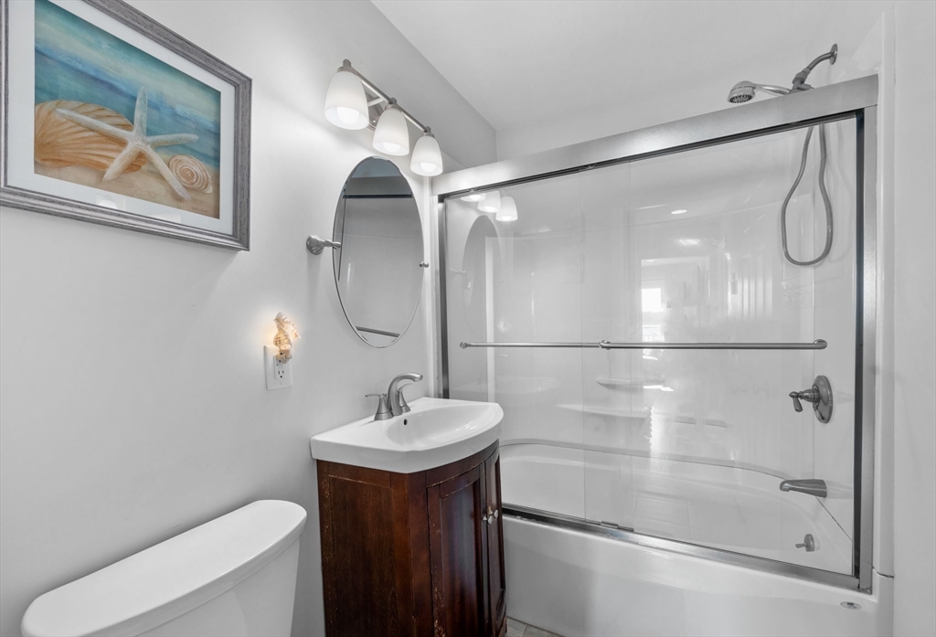 2 Wychunas Avenue Wareham, MA 02532 - Photo 20 of 37 a bathroom with a shower sink and mirror