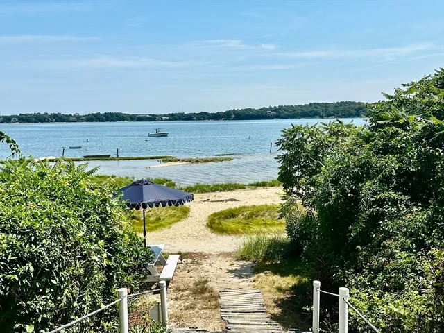 a view of a lake with a outdoor space