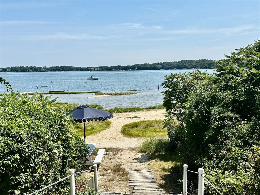 2 Wychunas Avenue Wareham, MA 02532 - Photo 4 of 37 a view of a lake with a outdoor space