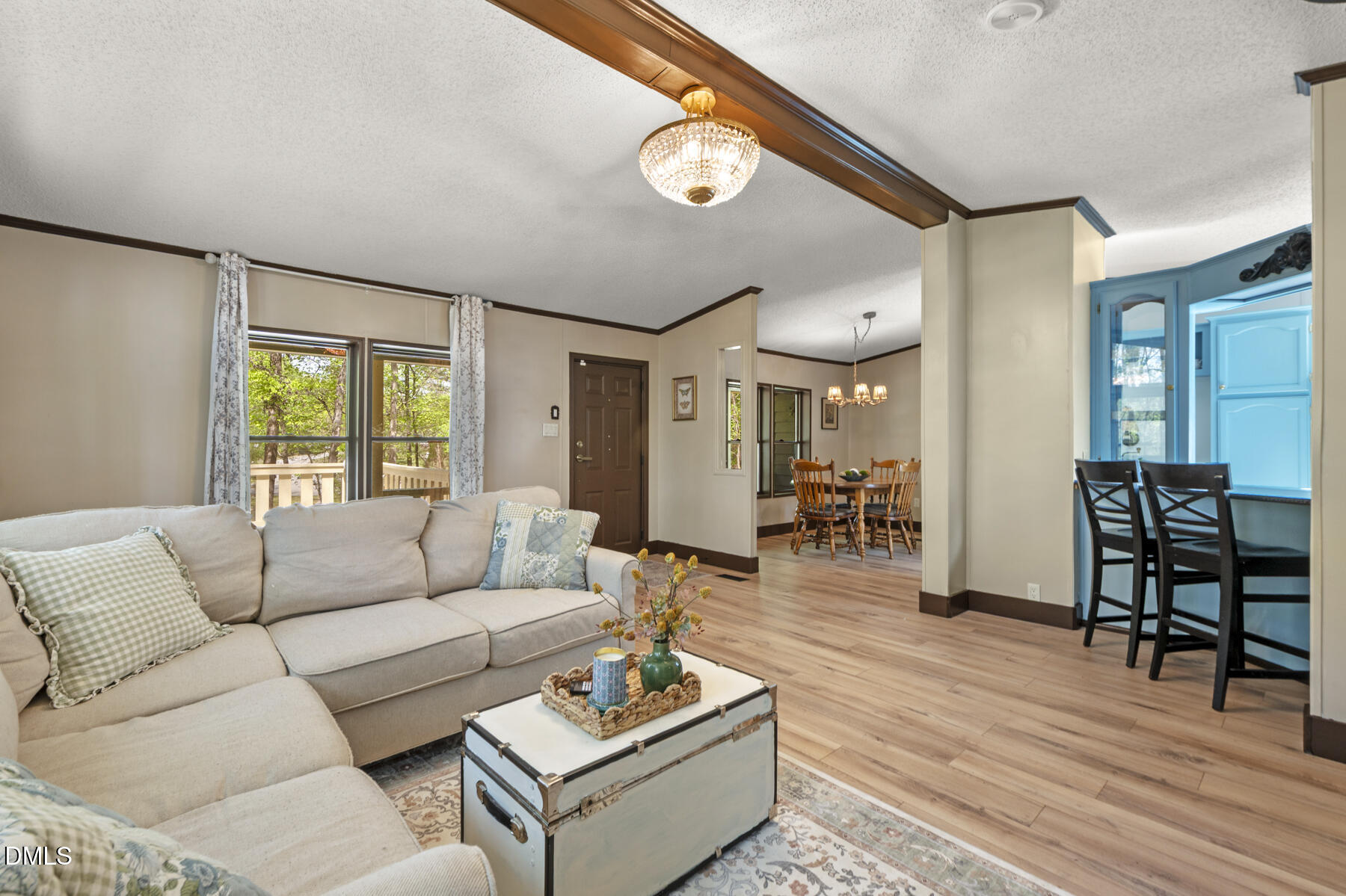 492 Little Mill Road Henderson, NC 27537 - Photo 8 of 39 a living room with furniture and wooden floor
