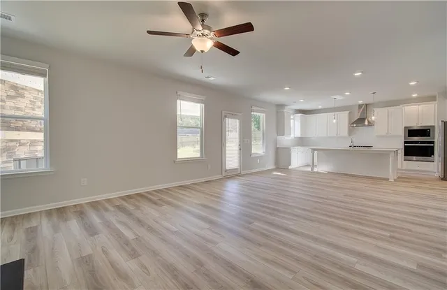 an empty room with windows