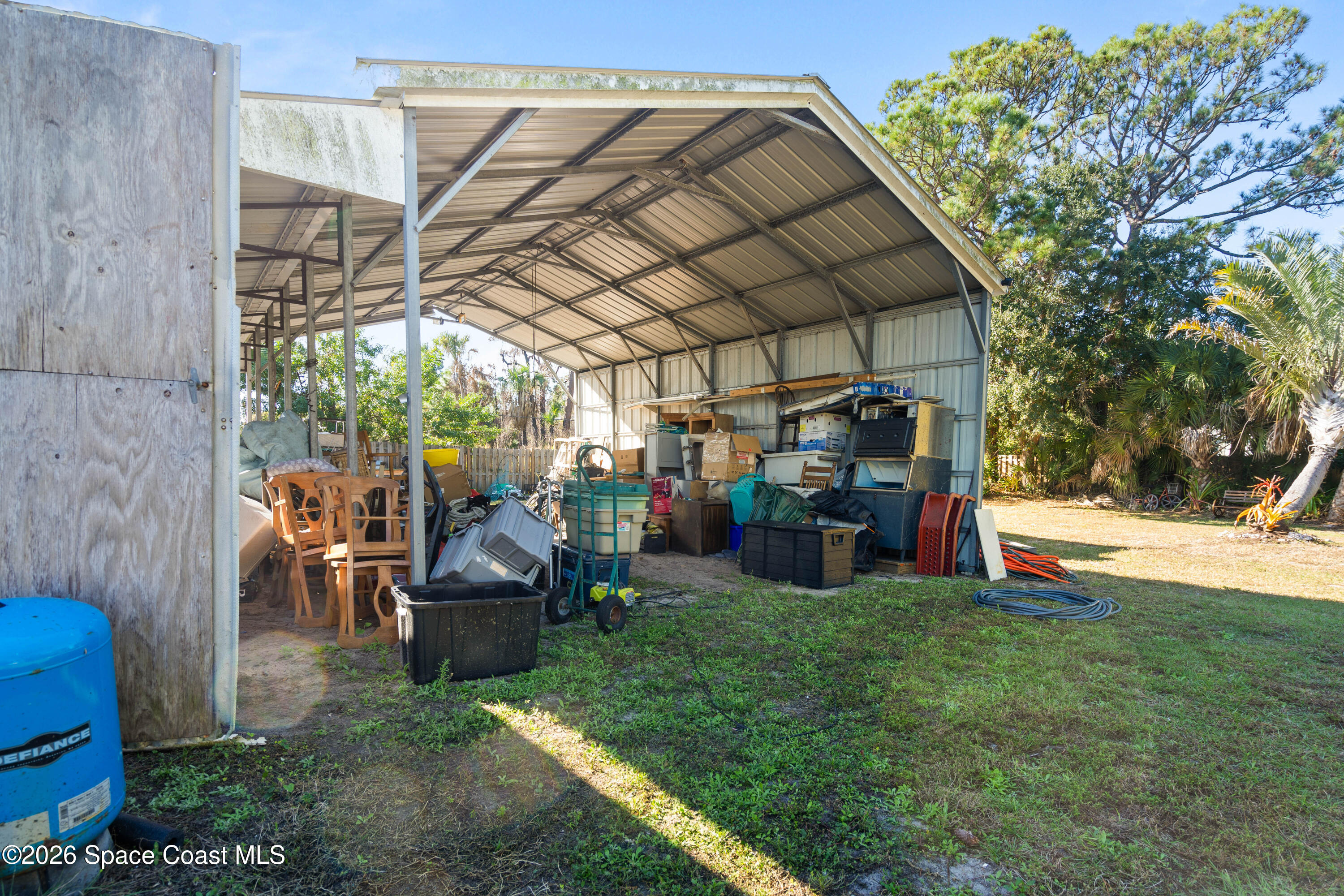 8280 Pine Ridge Trail Sebastian, FL 32976 - Photo 22 of 43 a view of a backyard