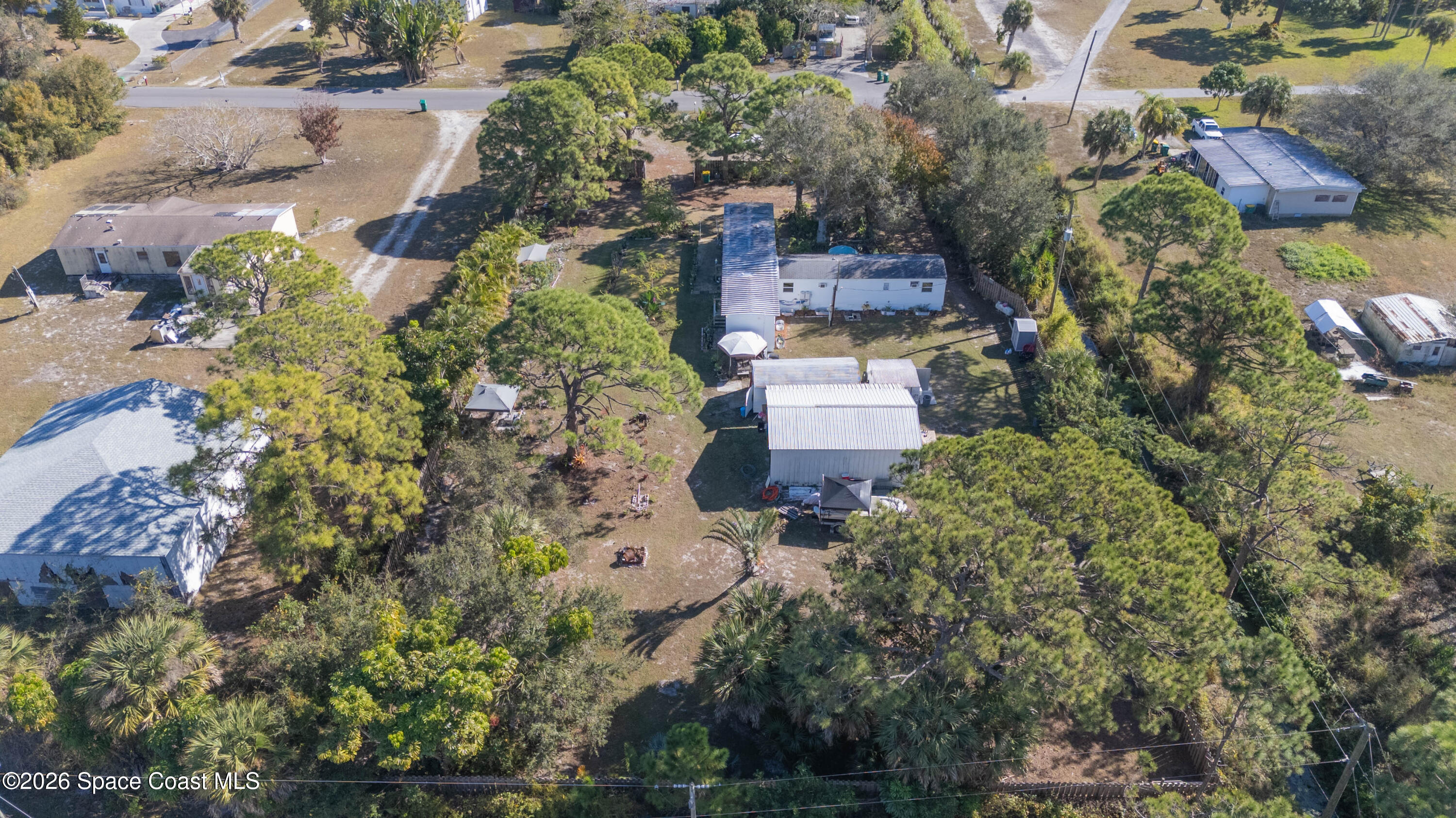 8280 Pine Ridge Trail Sebastian, FL 32976 - Photo 29 of 43 an aerial view of a house with a yard