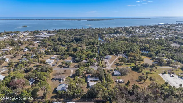 a view of road and covered with green space