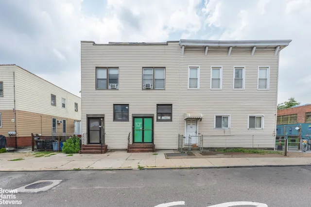 a view of a house with a garage