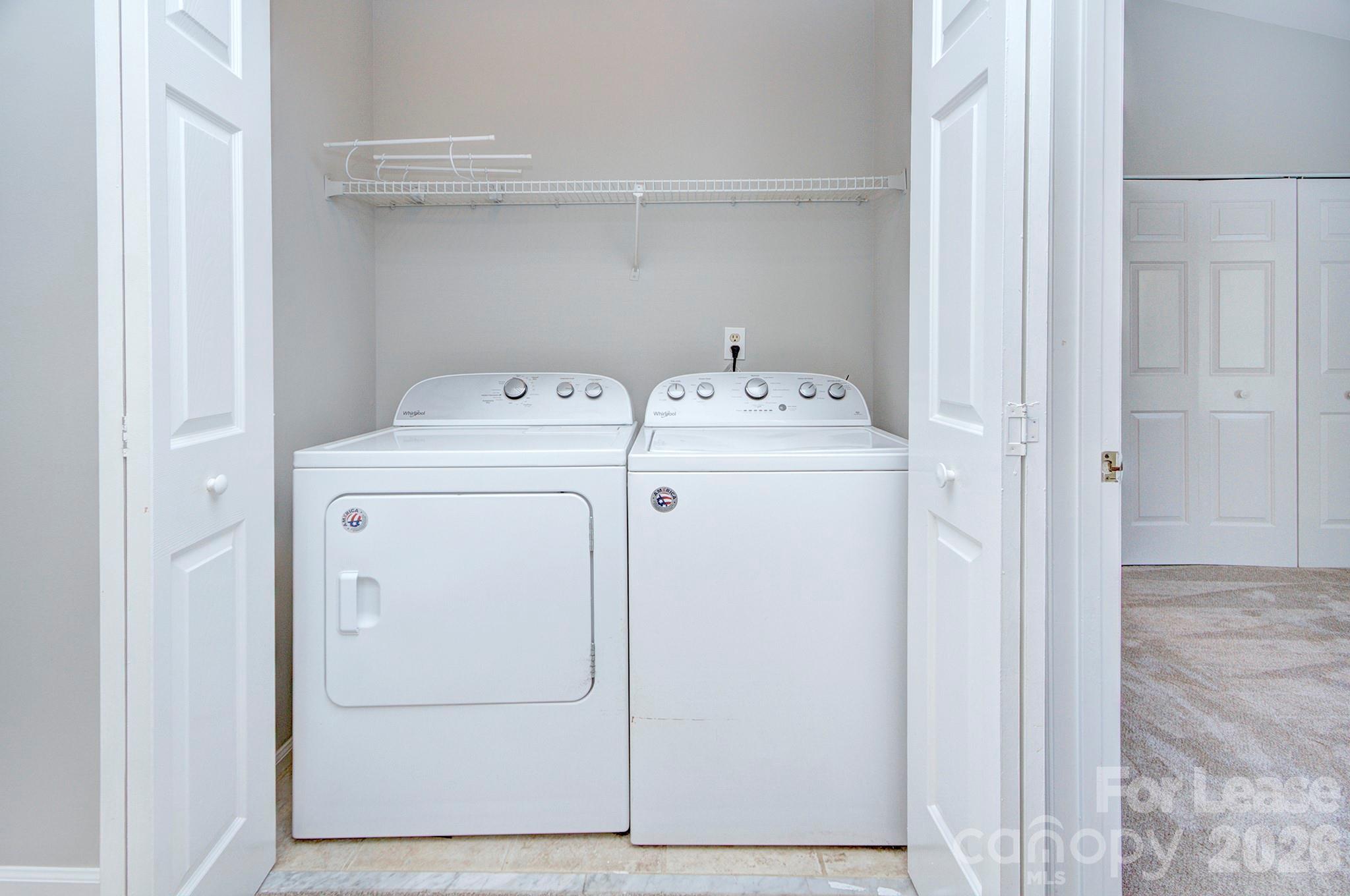 8268 Golf Ridge Drive Charlotte, NC 28277 - Photo 22 of 24 a utility room with dryer and washer
