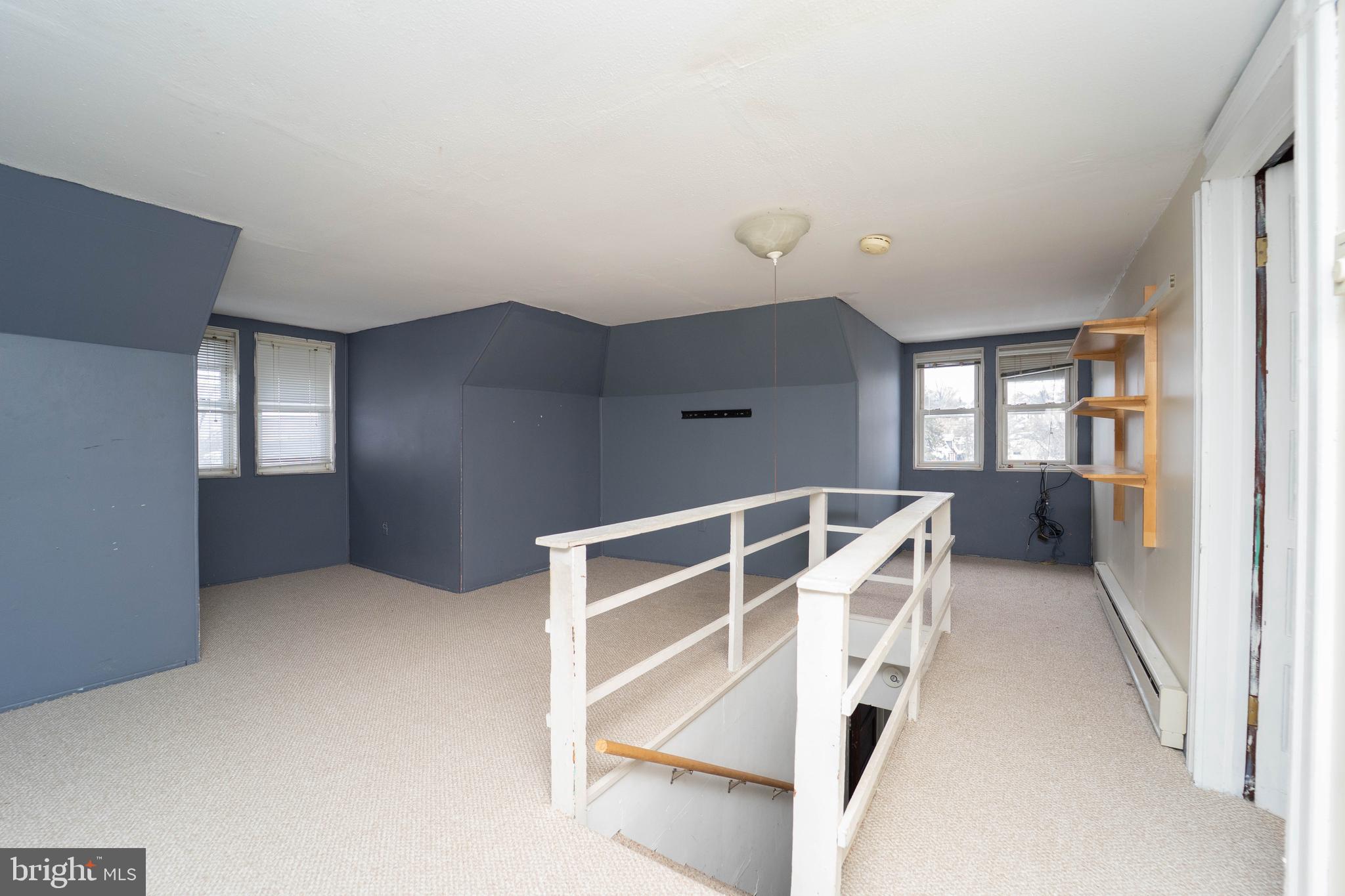 3204 Batavia Avenue Baltimore, MD 21214 - Photo 29 of 31 a view of an empty room with a fireplace