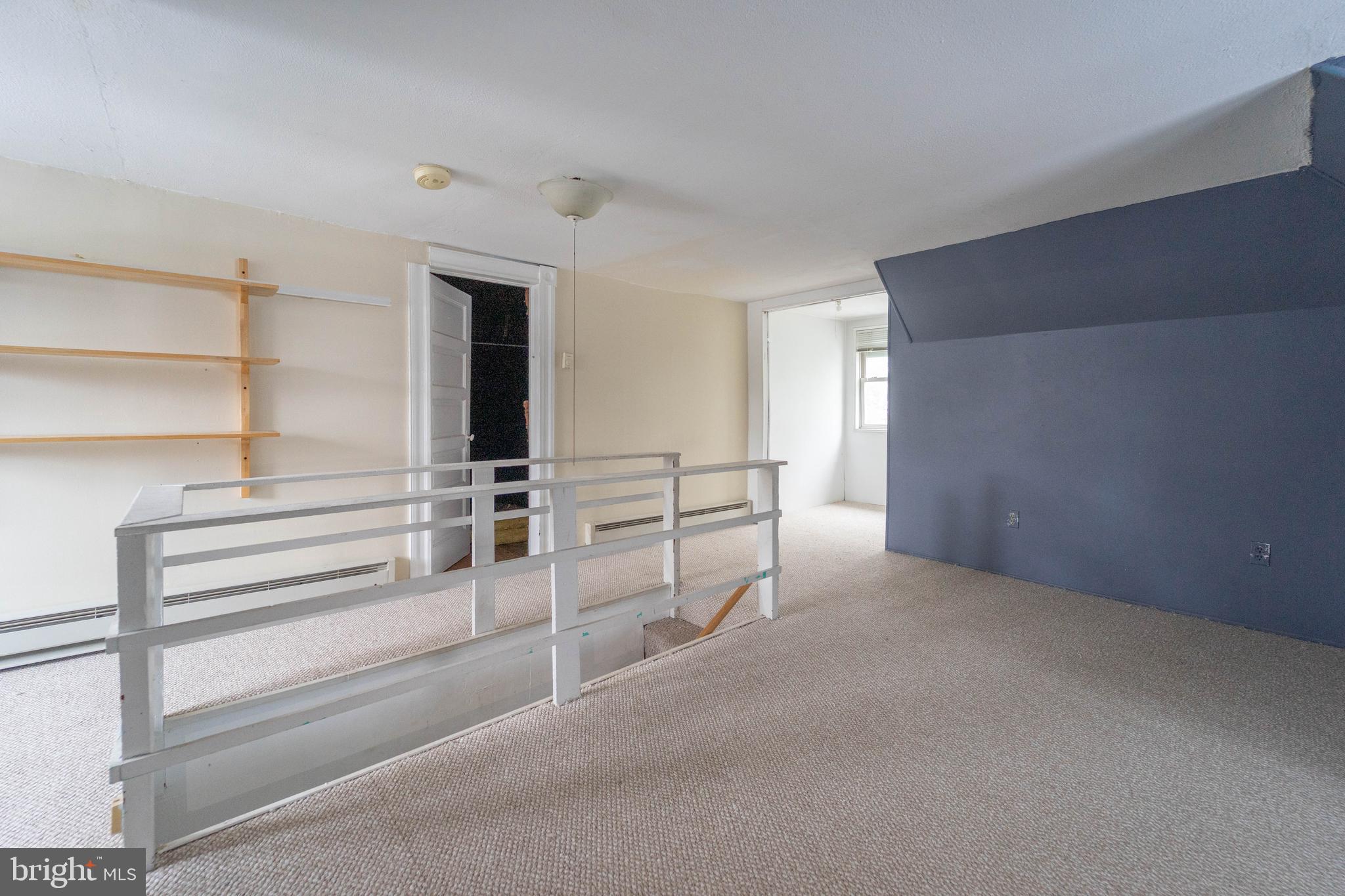 3204 Batavia Avenue Baltimore, MD 21214 - Photo 30 of 31 a view of an empty room with stairs