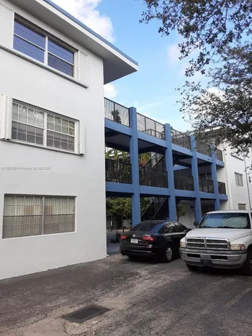 a car parked in front of a building
