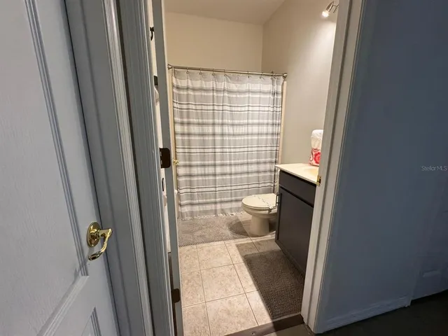 a bathroom with a sink and toilet