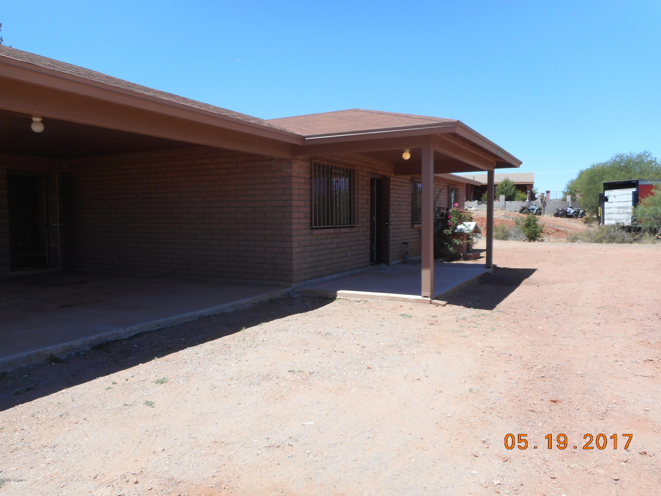 165 Entrada Court Rio Rico, AZ 85648 - Photo 1 of 33 a view of a house with a backyard