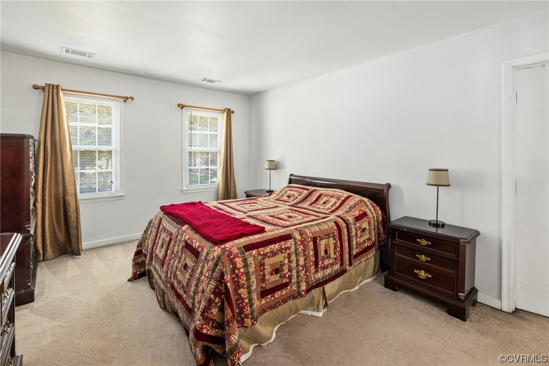 13637 Decidedly Court Midlothian, VA 23112 - Photo 16 of 25 a bedroom with a bed and a closet