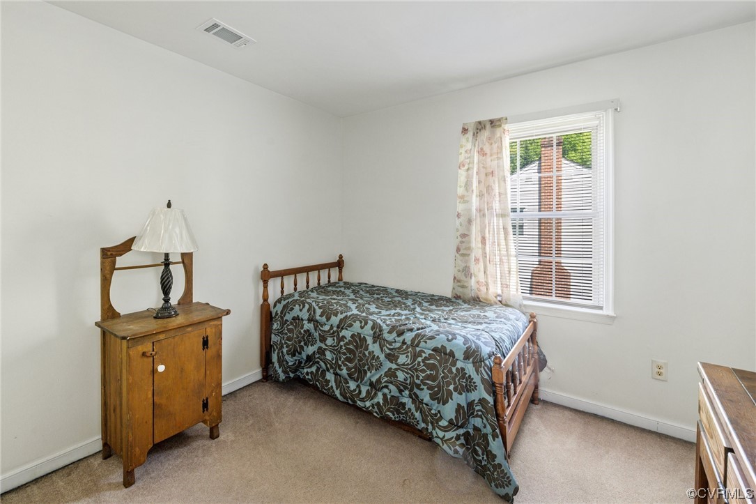13637 Decidedly Court Midlothian, VA 23112 - Photo 19 of 25 a bedroom with a bed and a window