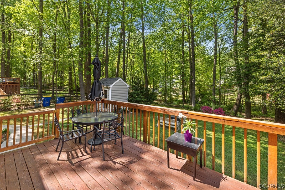 13637 Decidedly Court Midlothian, VA 23112 - Photo 21 of 25 a view of a chairs and table on the wooden deck