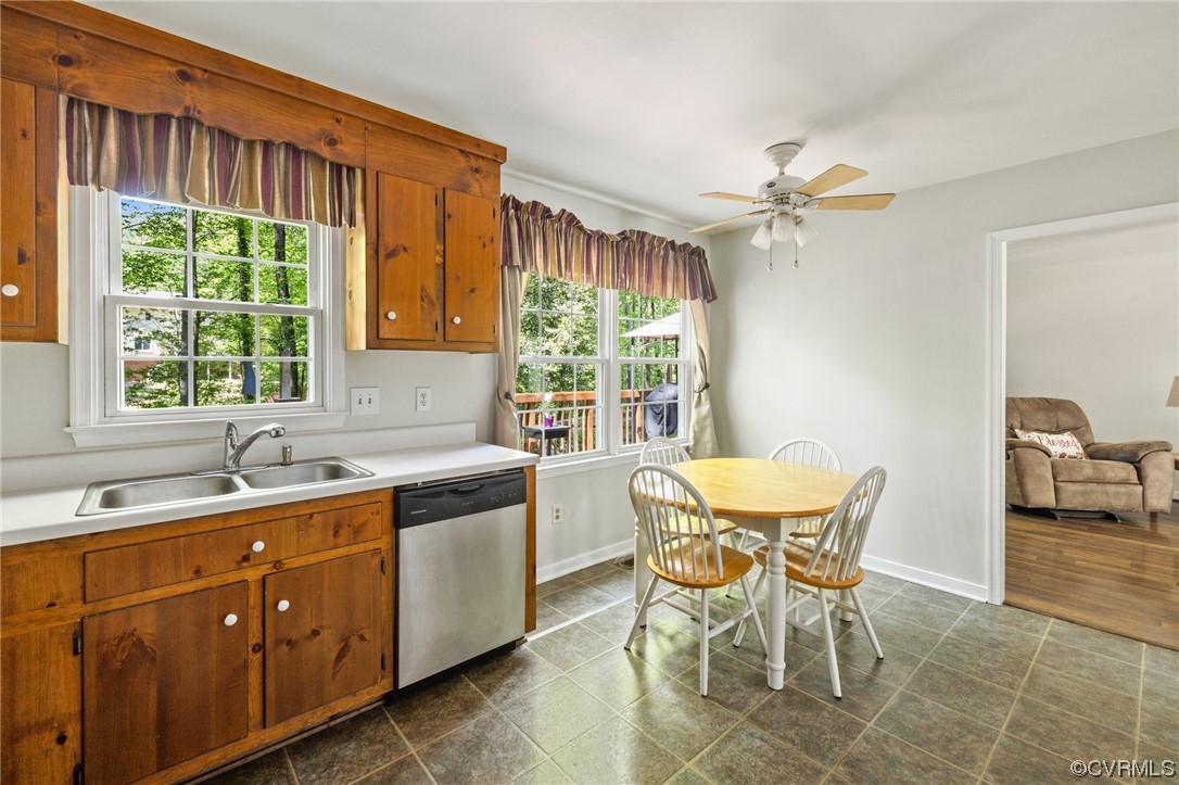 13637 Decidedly Court Midlothian, VA 23112 - Photo 10 of 25 a kitchen with a table chairs and a sink