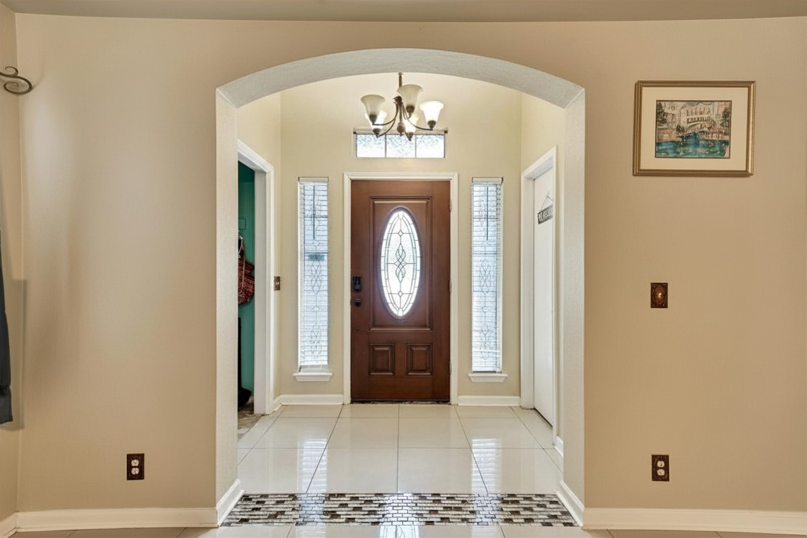 2601 Highcloud Drive Lockhart, TX 78644 - Photo 4 of 30 a view of an entryway with a chandelier