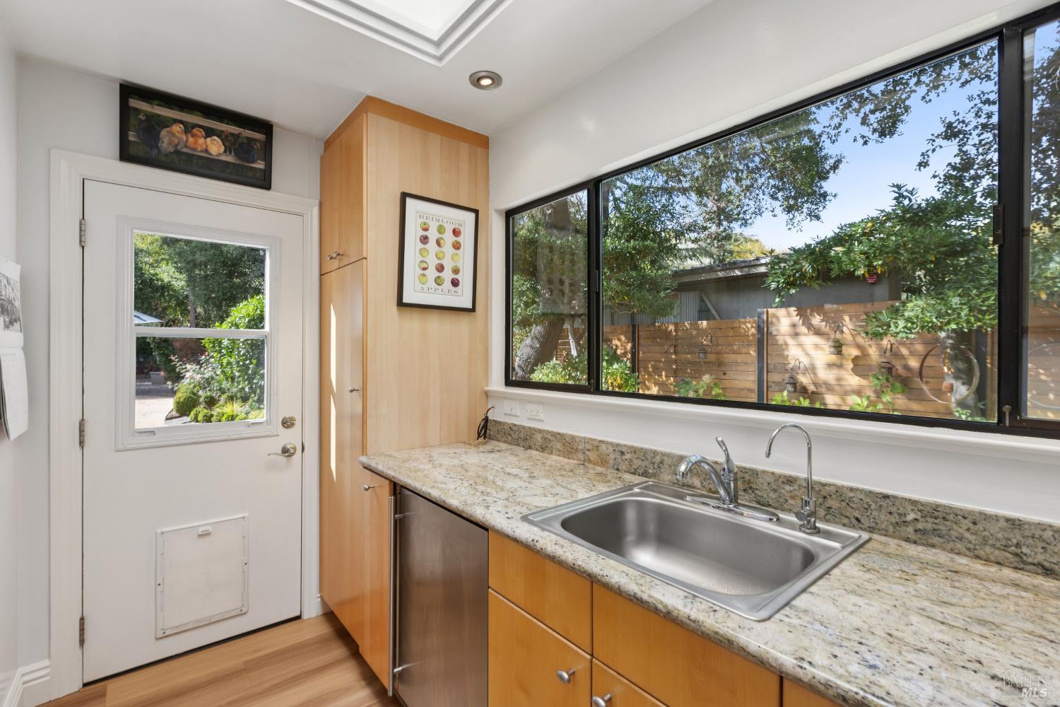 1030 Yell Road Glen Ellen, CA 95442 - Photo 32 of 73 a bathroom with a granite countertop sink and a large mirror