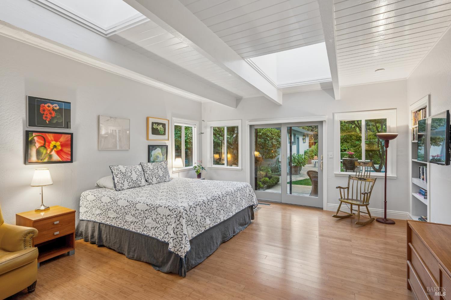 1030 Yell Road Glen Ellen, CA 95442 - Photo 38 of 73 a bedroom with a large bed and a large window