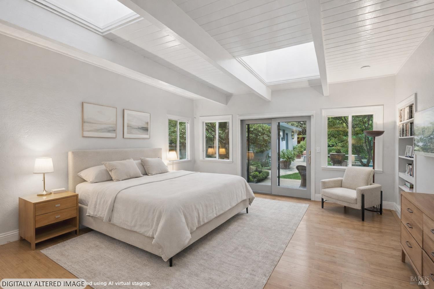 1030 Yell Road Glen Ellen, CA 95442 - Photo 39 of 73 a bedroom with a large bed and a large window