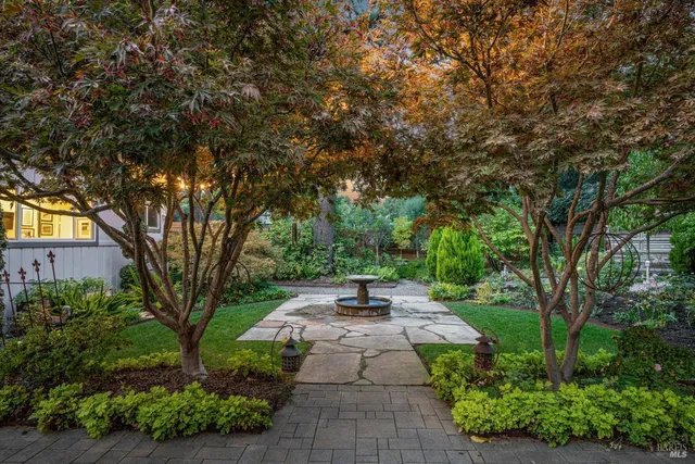 a view of a pathway with a patio