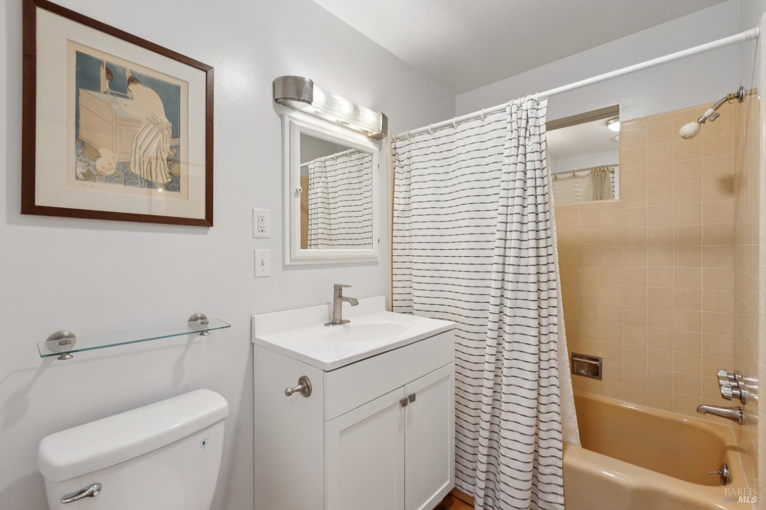 1030 Yell Road Glen Ellen, CA 95442 - Photo 50 of 73 a bathroom with a toilet a sink and mirror