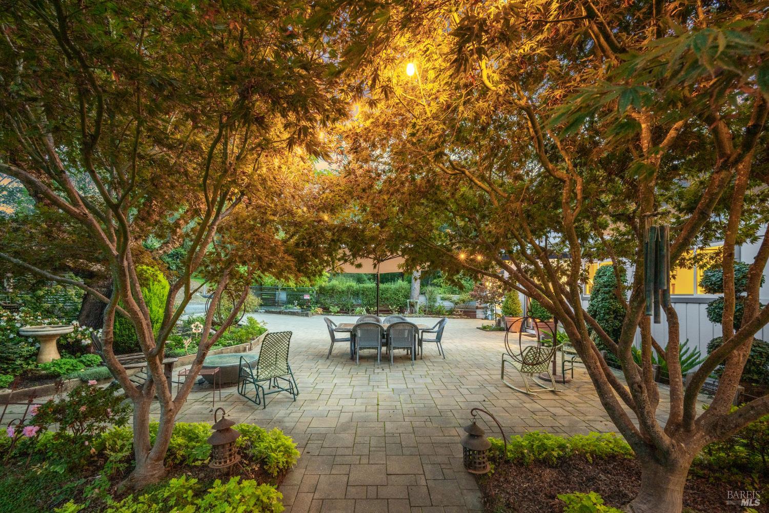 1030 Yell Road Glen Ellen, CA 95442 - Photo 5 of 73 a view of a patio with table and chairs and potted plants