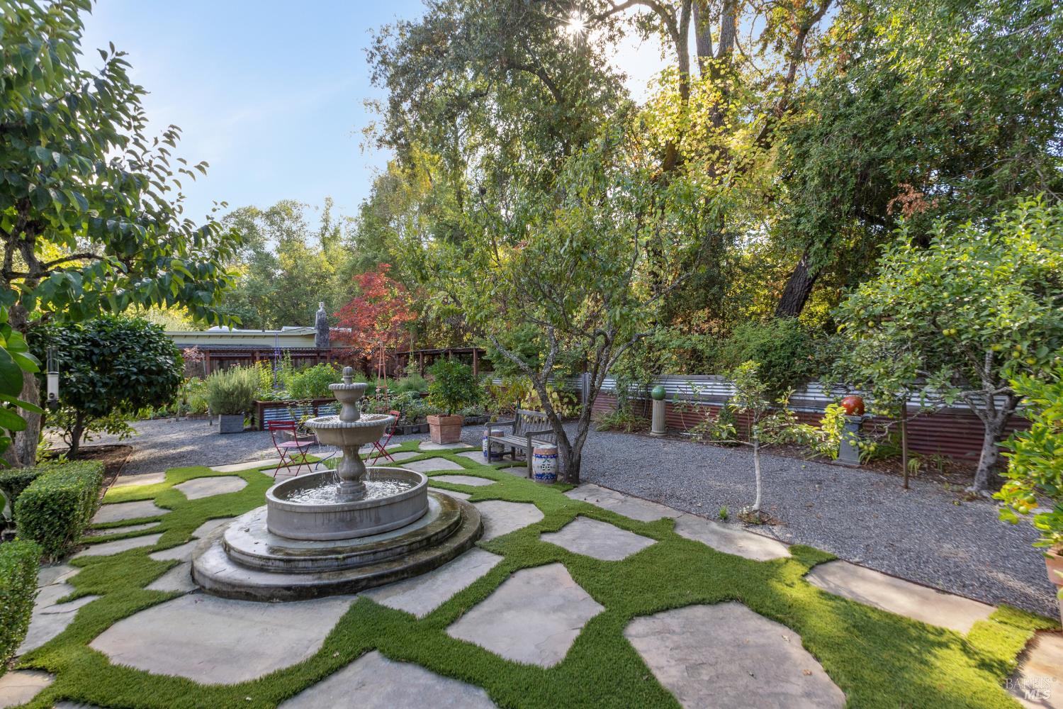 1030 Yell Road Glen Ellen, CA 95442 - Photo 57 of 73 Fountain patio - growing garden and creek beyond.