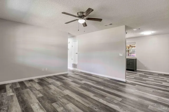 a bathroom with a sink and a large mirror