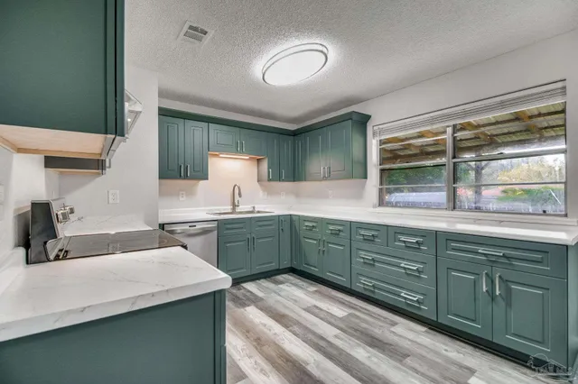 a view of a livingroom with wooden floor and closet