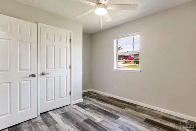 a view of backyard with tree