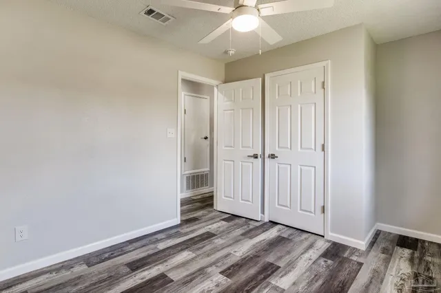 a view of a backyard with tree s