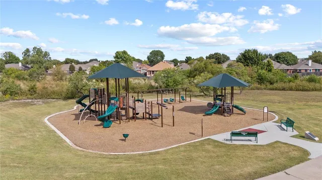 an aerial view of house with a swimming pool