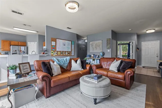 a living room with furniture and a couch