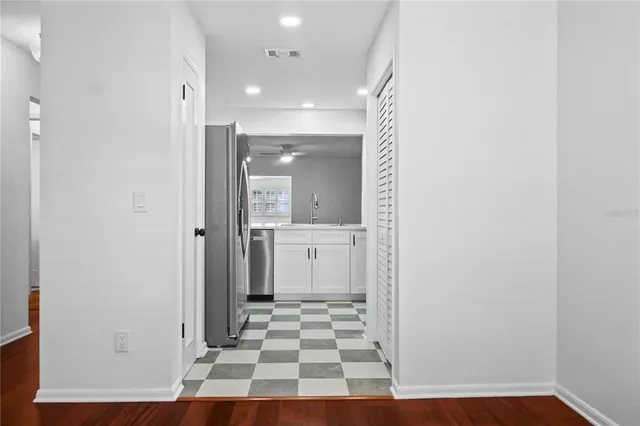 a view of a bathroom with a sink and a shower