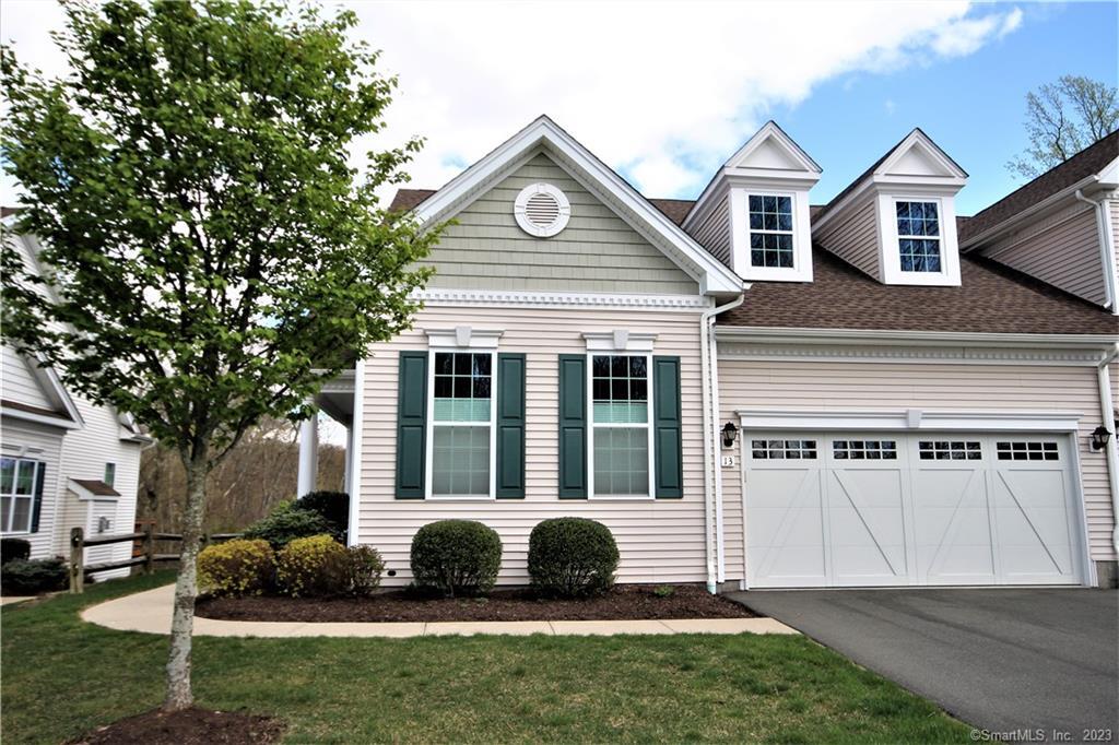 End unit Kimberton Ranch with a 2 car attached garage.