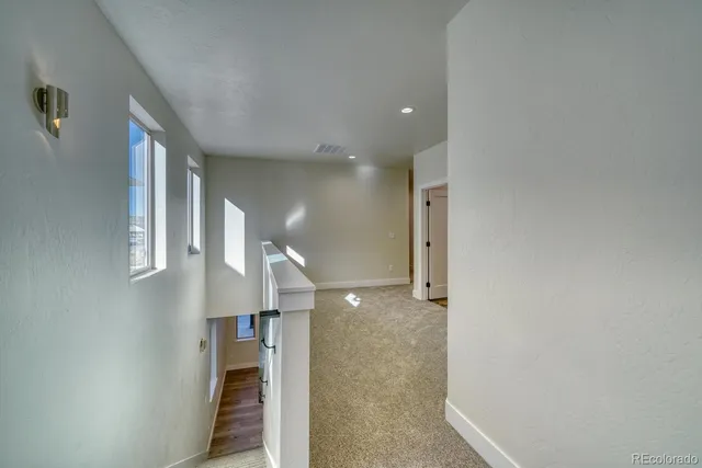 a view of a hallway with entryway