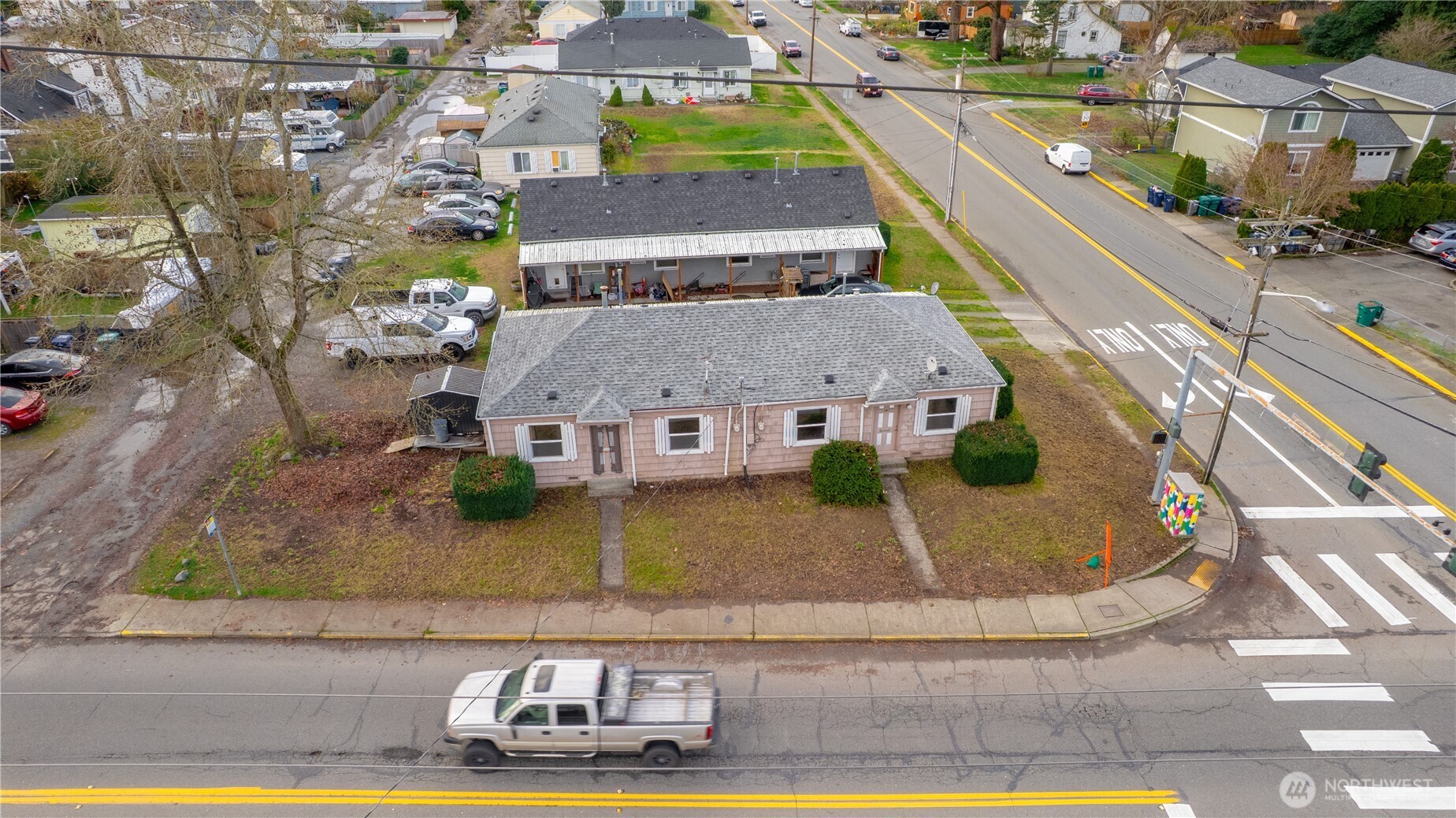 an aerial view of a house with swimming pool