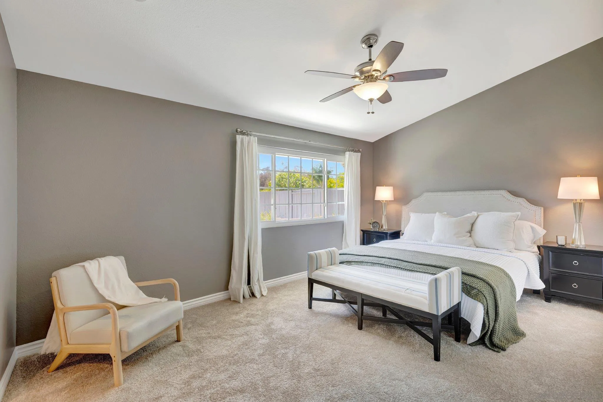 13057 Triumph Drive Poway, CA 92064 - Photo 11 of 31 a spacious bedroom with a bed and window