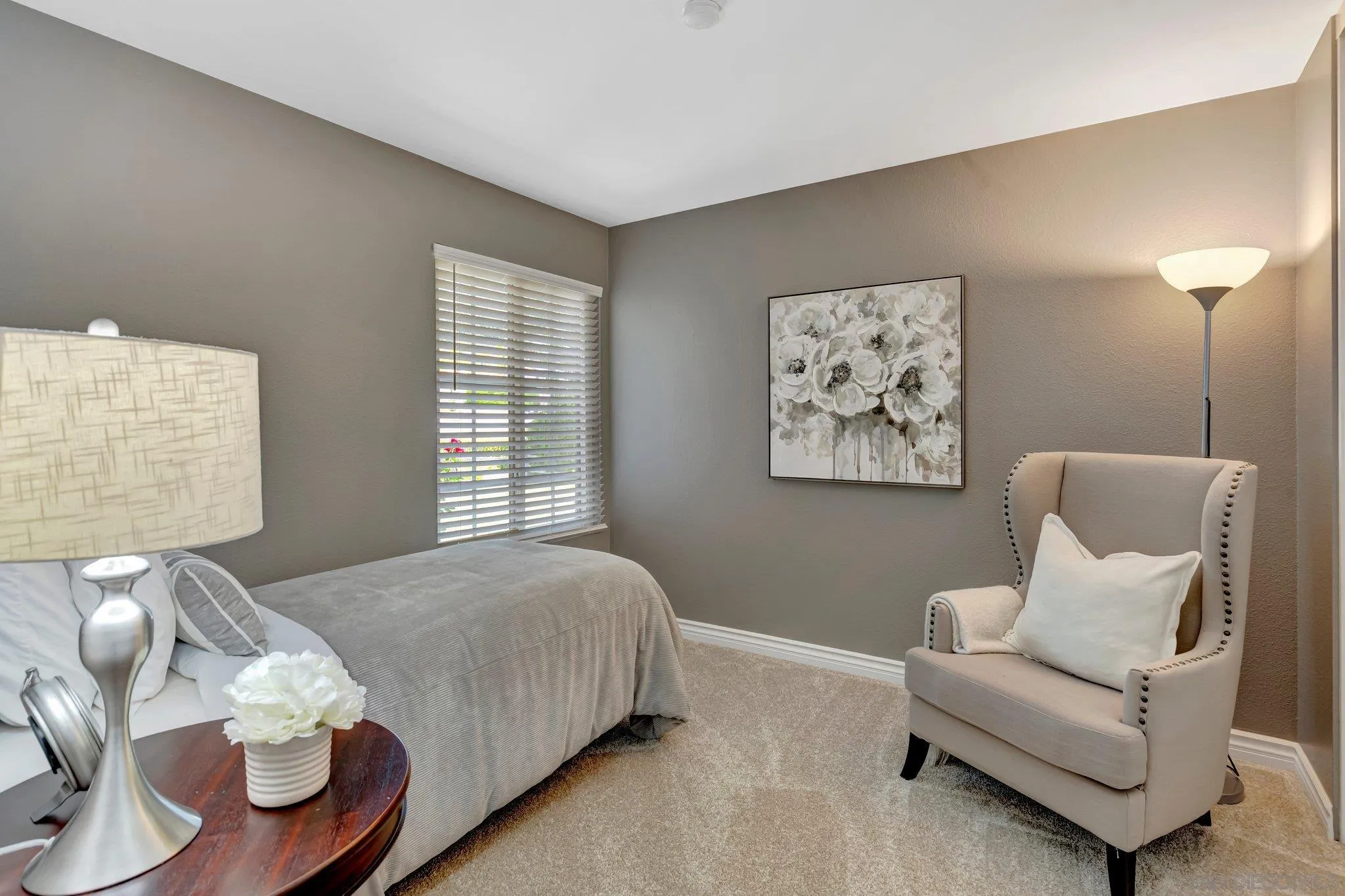 13057 Triumph Drive Poway, CA 92064 - Photo 13 of 31 a bedroom with furniture and a large window