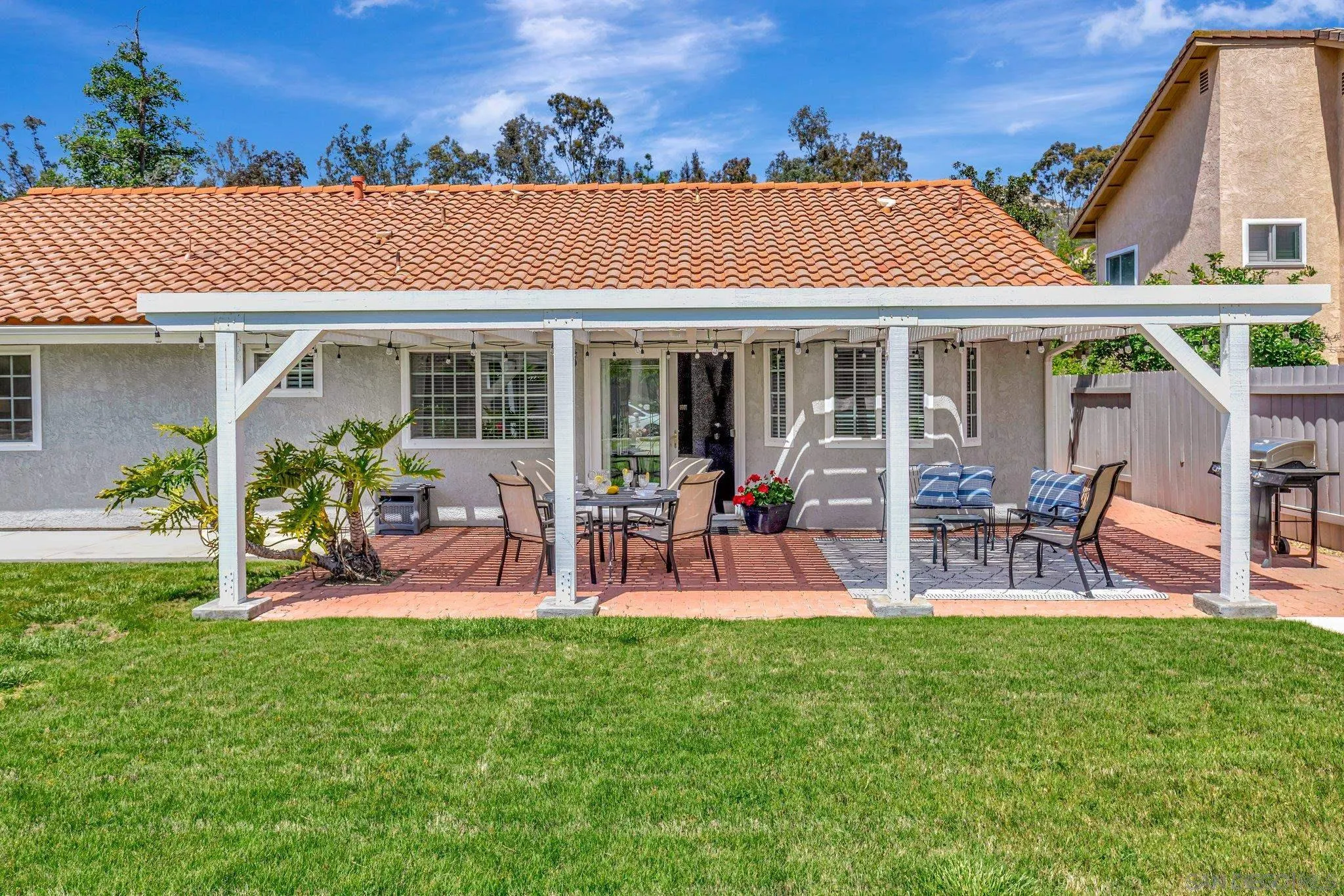 13057 Triumph Drive Poway, CA 92064 - Photo 23 of 31 a view of a house with a yard and sitting area