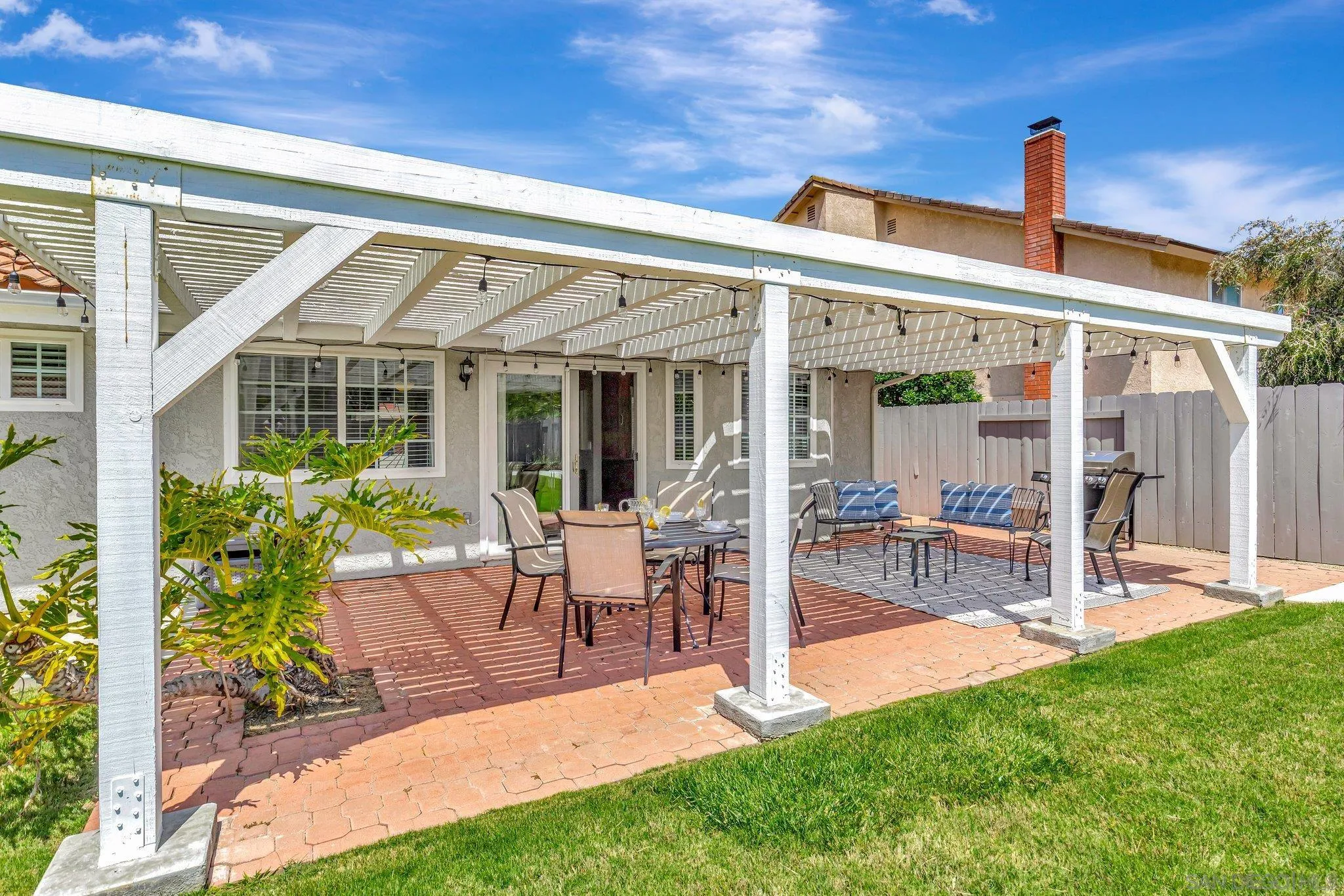 13057 Triumph Drive Poway, CA 92064 - Photo 24 of 31 a front view of house with a garden and patio