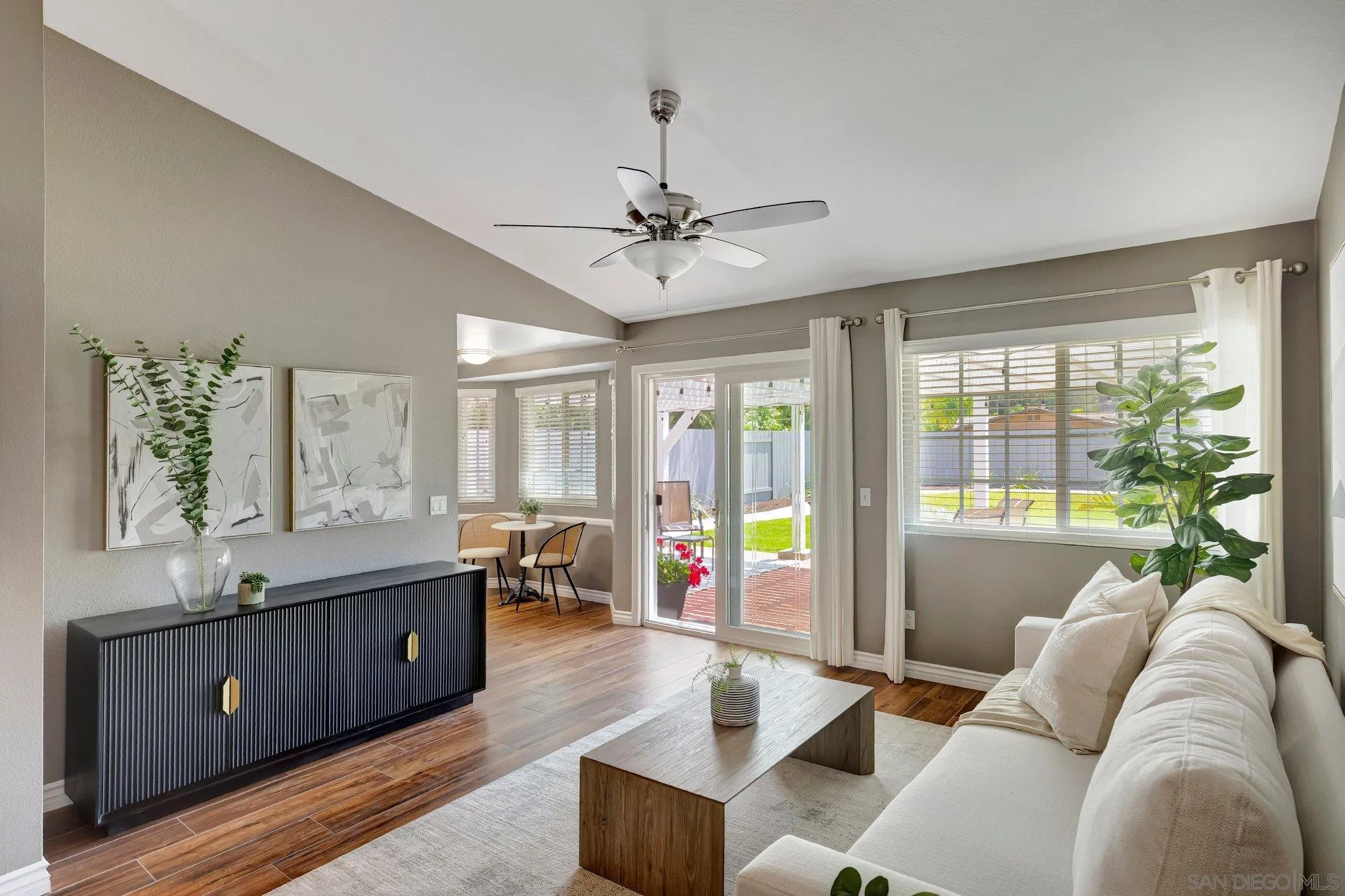 13057 Triumph Drive Poway, CA 92064 - Photo 9 of 31 a living room with furniture and a large window