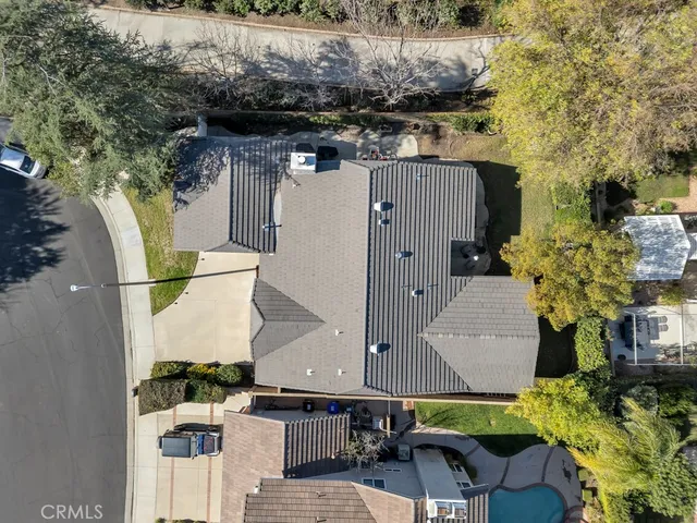 a view of a backyard with sitting area
