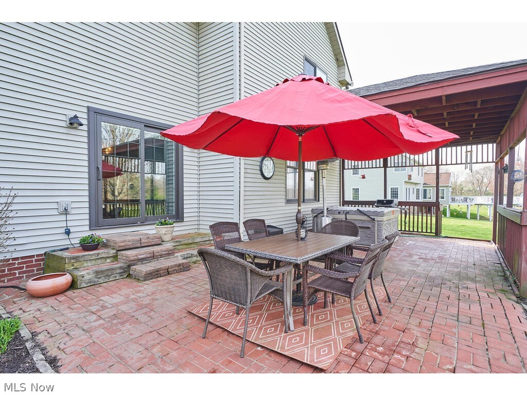 1587 South Hametown Road Akron, OH 44321 - Photo 31 of 35 Paver patio and covered patio to enjoy the quiet backyard