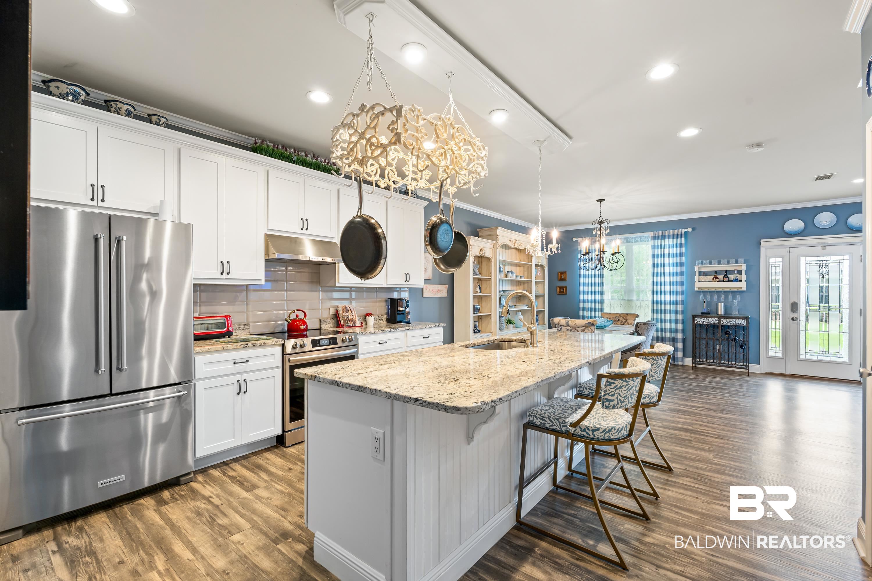 1113 Yellow Daisy Lane Foley, AL 36535 - Photo 14 of 35 Kitchen with stainless steel appliances, backsplash, dark wood-style flooring, recessed lighting, and white cabinetry