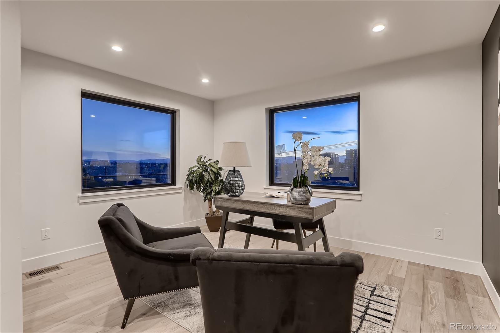29 Harrison Street Denver, CO 80206 - Photo 22 of 40 a dining room with furniture and window